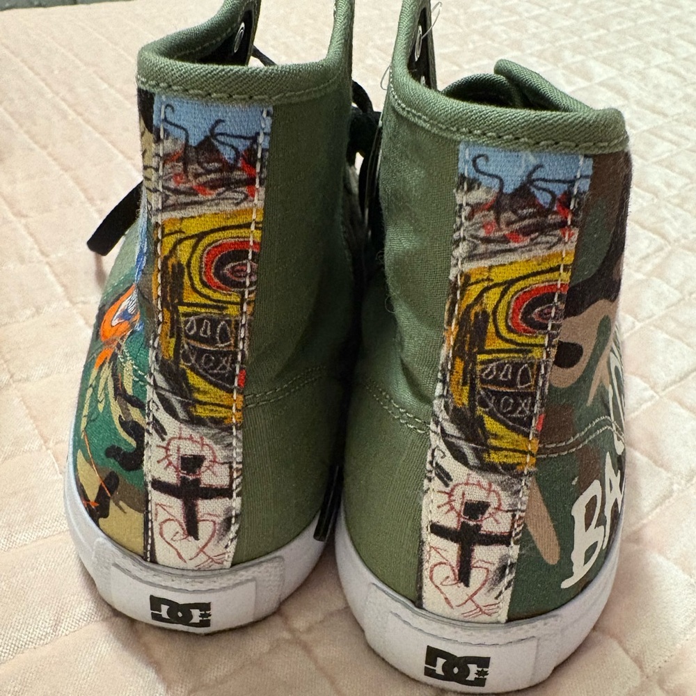 Men’s size 10 DC high top sneakers! New with tags.